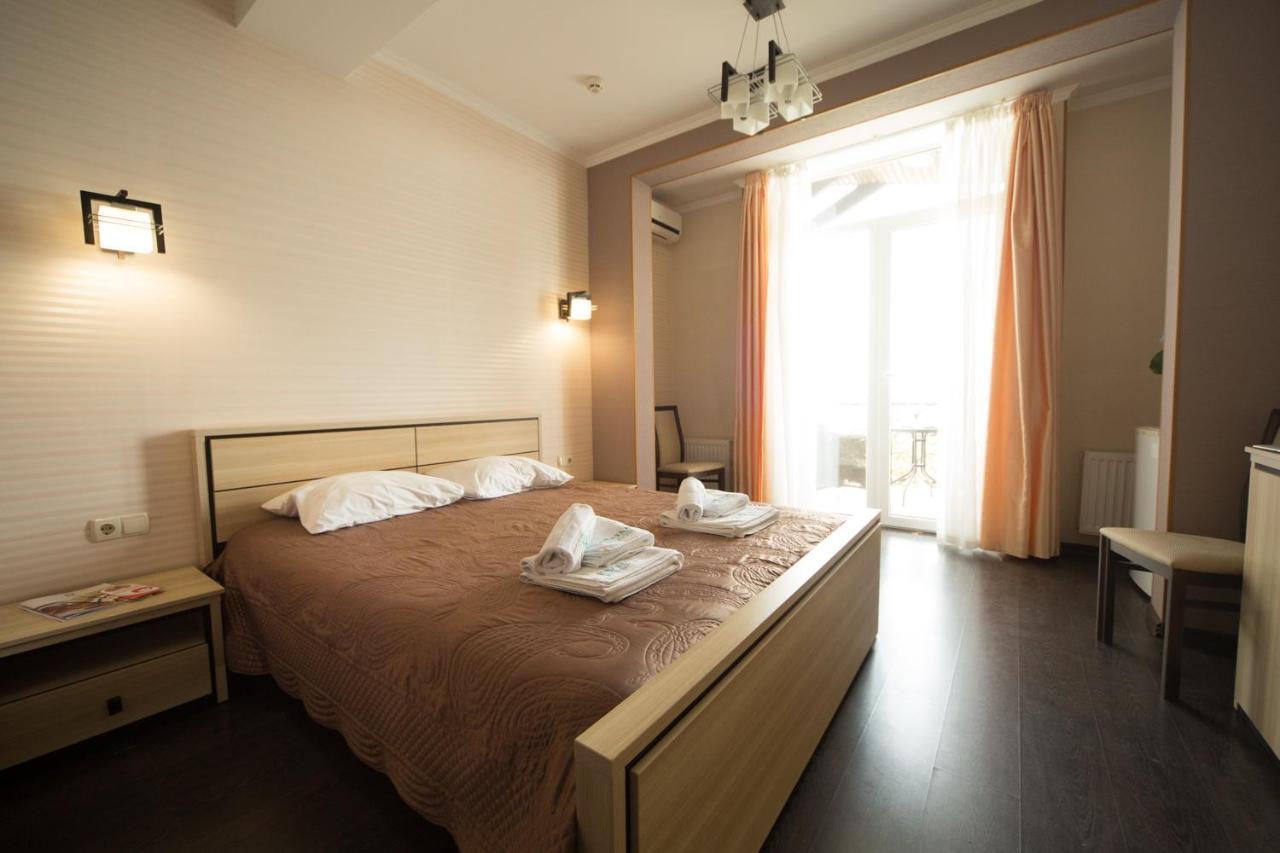 Kolyada Hotel Odessa Chambre photo