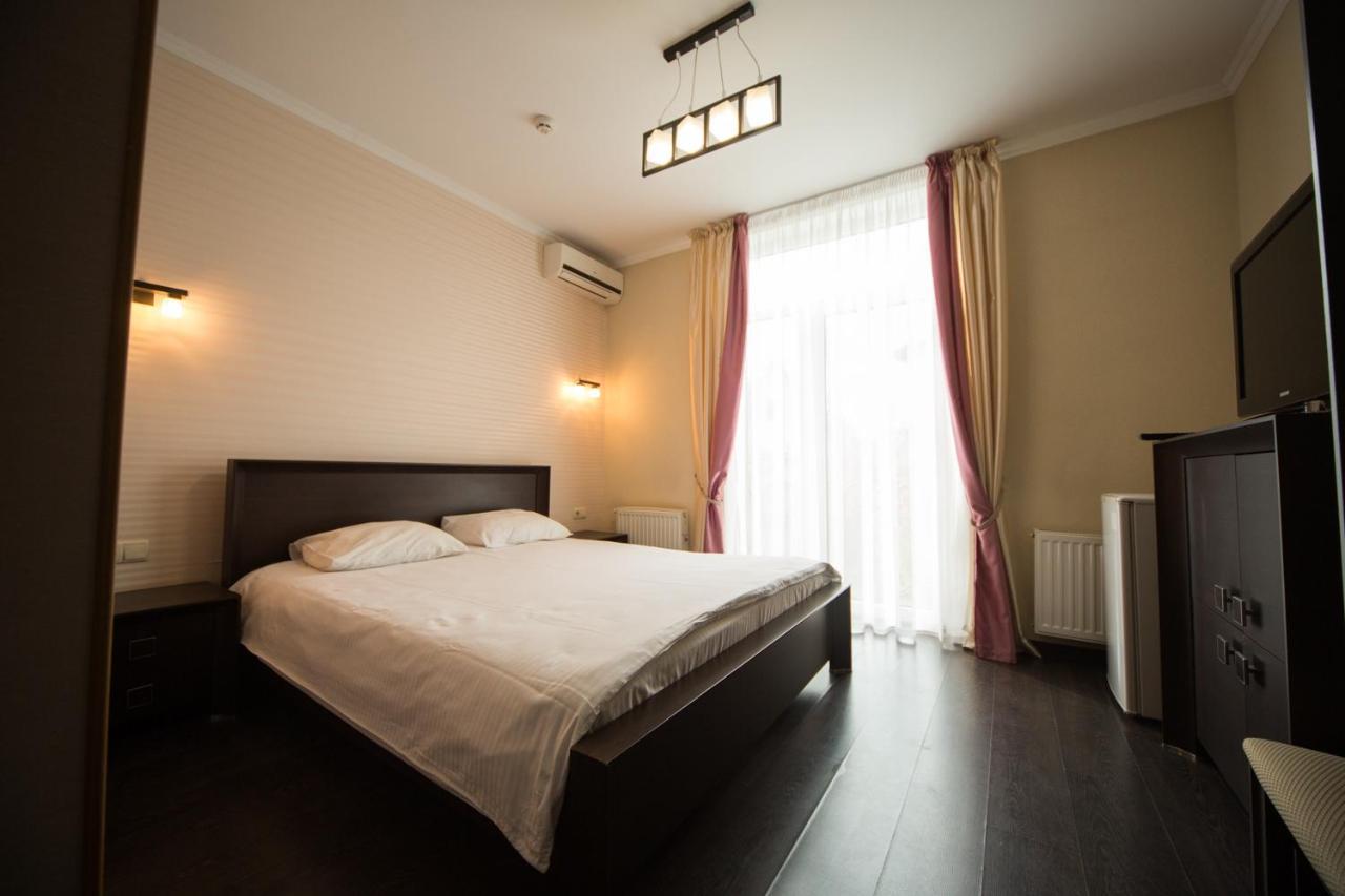 Kolyada Hotel Odessa Chambre photo